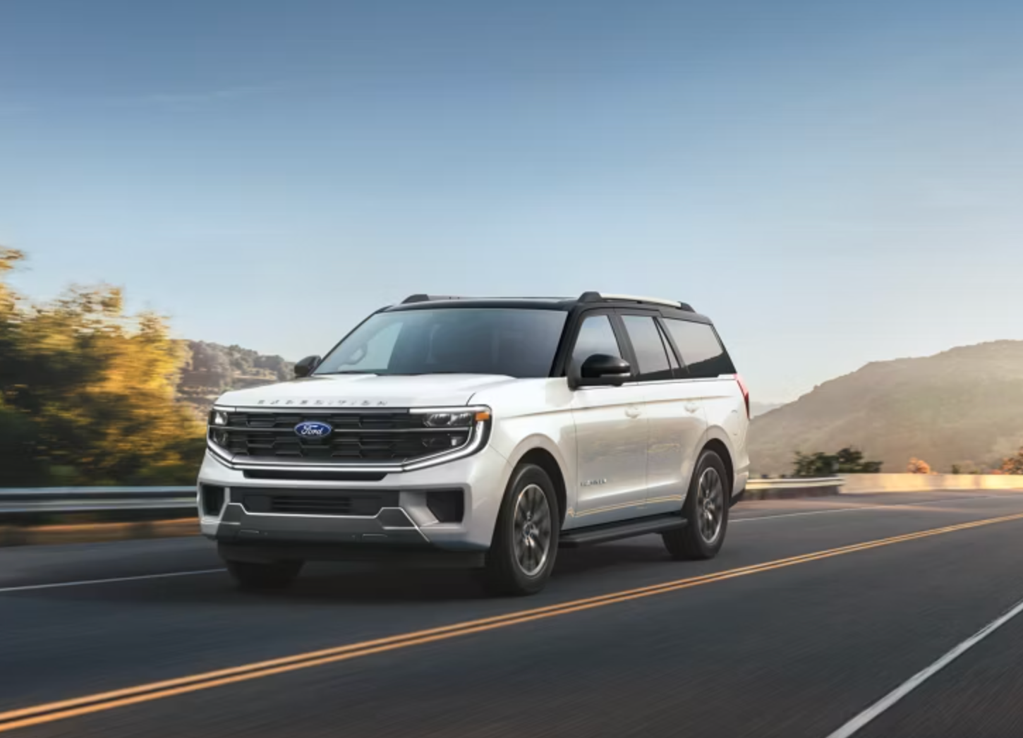 white 2026 Ford Expedition driving