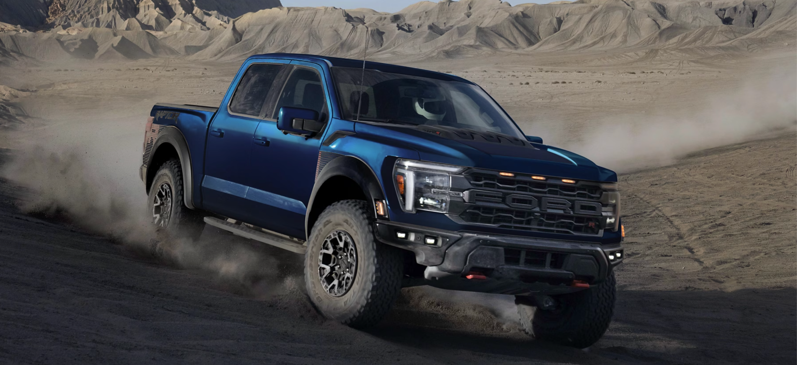 Blue Ford F-150 Driving